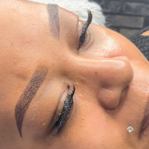Defined dark brows after permanent makeup