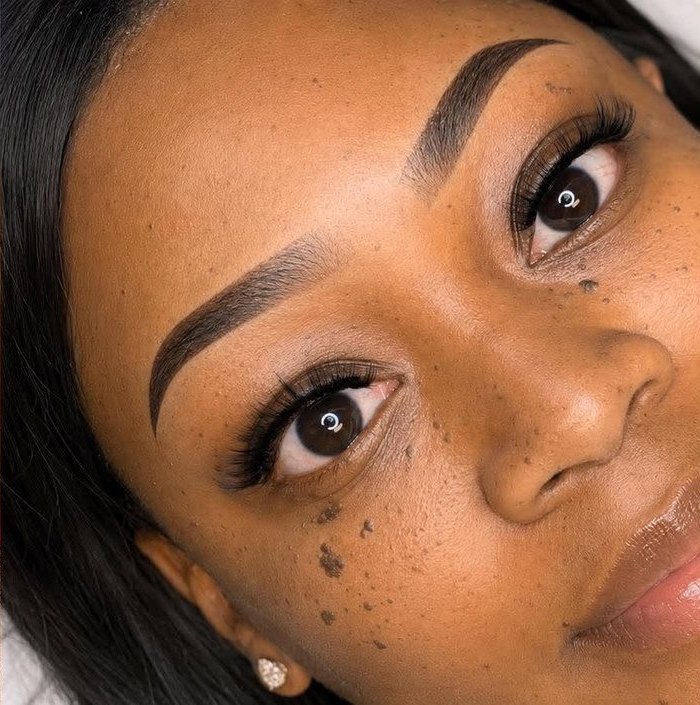 Healed ombré brows on a client with deeper skin