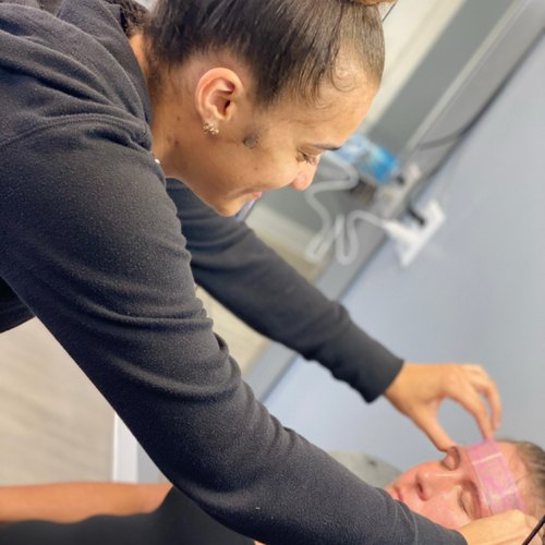 LaSheen working on a client at her Houston studio